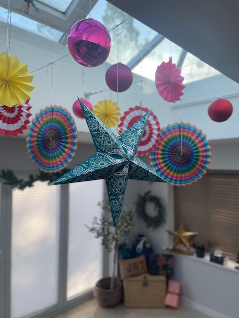 Paperstarlight lantern above dining table